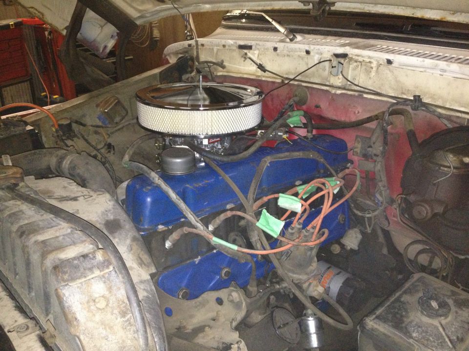 Engine bay with blue valve covers and chrome air cleaner