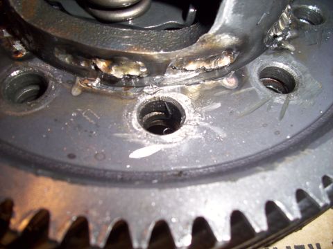 1995 Ford Probe - This image shows a close-up of a mechanical part with evidence of welding and internal components.