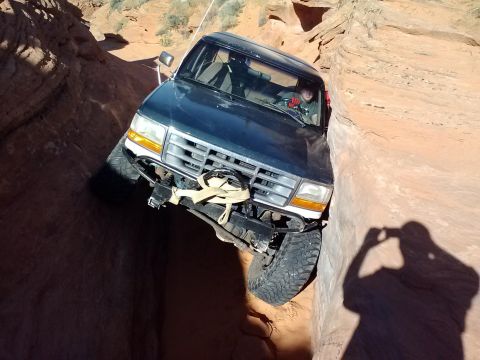 1994 Ford Bronco - This 1994 Ford Bronco is carefully maneuvering through a tight, rocky canyon.