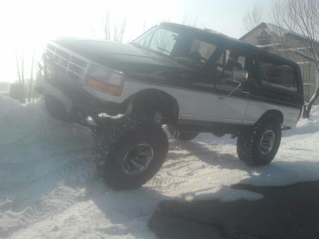 1994 Ford Bronco in snow, 3q front view