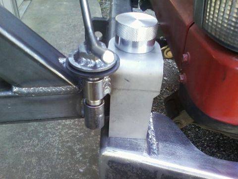 1989 Ford Bronco - Close-up of a custom-mounted fuel filler neck and a knurled aluminum cap.