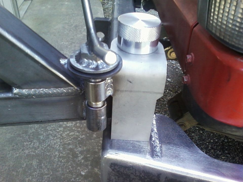 Custom fuel filler neck and cap on a vehicle frame