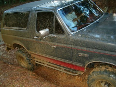 1991 Ford Bronco - This 1991 Ford Bronco is shown navigating a muddy off-road trail.