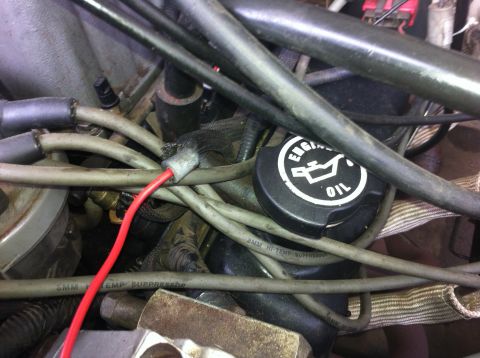 1990 Ford F-150 - Close-up of engine components including an oil cap and various wires.