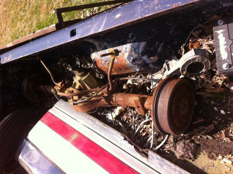 1991 Ford Bronco - Rear axle assembly, likely from an older truck or SUV, is shown in a state of disrepair.
