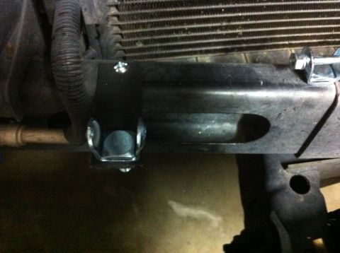 2005 Dodge 1500 - Detail of vehicle undercarriage components, including frame and radiator assembly.