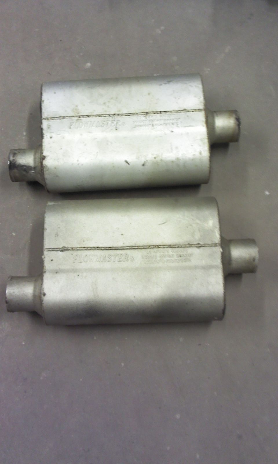 Two Flowmaster exhaust mufflers