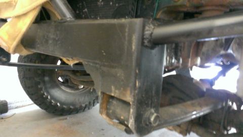 1994 Ford Bronco - Detail shot of vehicle undercarriage, showing frame and suspension elements.