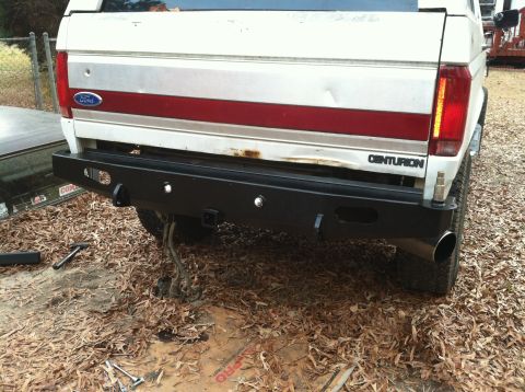1992 Ford C-350 (Centurion Conversions) - Rear view of a 1992 Ford C-350 (Centurion Conversions) with a new bumper.