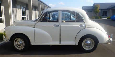 1969 MINI Cooper - This Morris Minor sedan, with its distinctive rounded body and chrome accents, is clearly not a 1969 MINI Cooper.