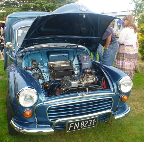 1969 MINI Cooper - Blue van with hood open, showing the engine bay and front grille. License plate FN 8231.