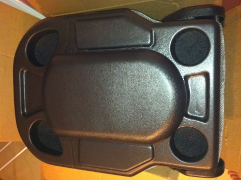 1992 Ford C-350 (Centurion Conversions) - This is a vehicle interior part, likely a center console, with multiple cup holders.