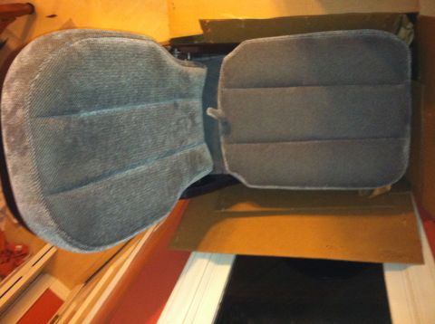 1992 Ford C-350 (Centurion Conversions) - Two grey fabric truck seats are shown, one with a split back, possibly for a Ford C-350.