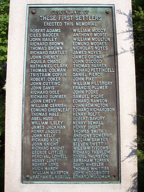Bronze memorial plaque listing names of first settlers