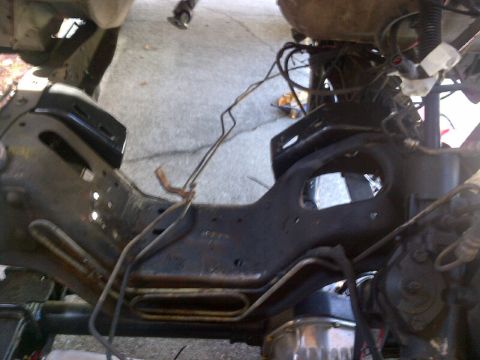1994 Ford Bronco - Undercarriage view showing frame and suspension parts, likely from a truck or SUV.
