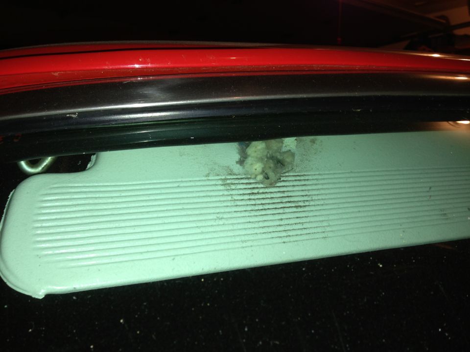 Interior sun visor with debris