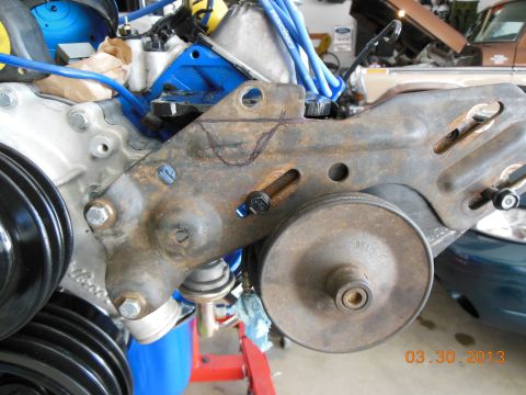 1979 Ford F-150 - Engine bracket and pulleys are shown in detail, with blue spark plug wires visible.