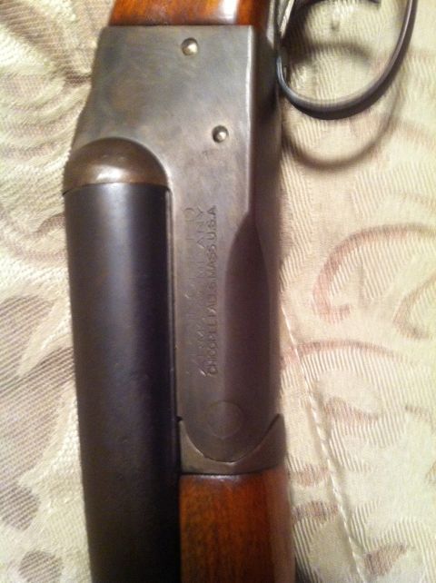 2005 Ford Crown Victoria - Close-up of a shotgun receiver showing manufacturer's location information.