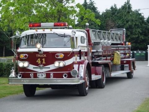 1991 Ford Crown Victoria - This fire truck has "TRUCK 41" on its grille and a visible license plate.