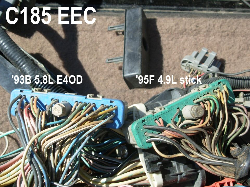 Two EEC engine wiring harness connectors labeled C185 for 5.8L and 4.9L