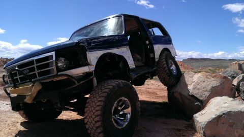 1994 Ford Bronco - This 1994 Ford Bronco is navigating a rocky off-road trail.