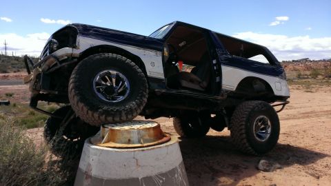 1994 Ford Bronco - This lifted 1994 Ford Bronco is positioned on a concrete structure, its off-road capabilities.
