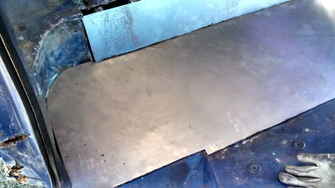 1979 Ford Bronco - A metal panel has been fitted to cover a section of the vehicle's floor, likely due to rust damage.