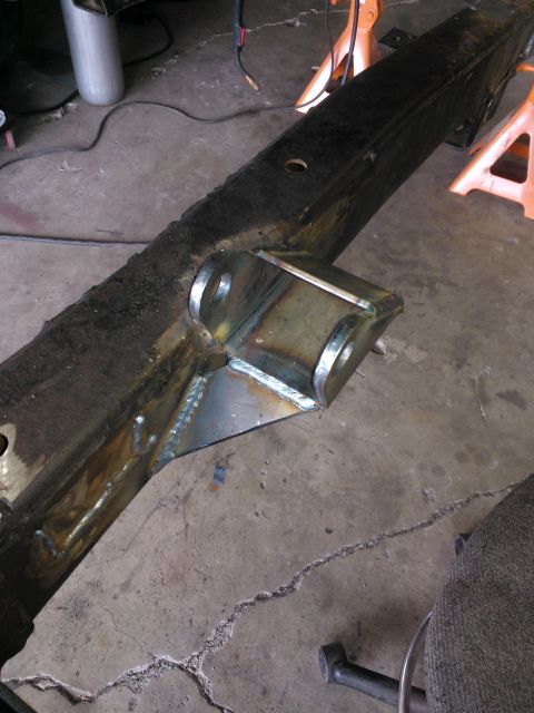 1968 Ford Bronco - Custom bracket welded onto a vehicle frame, likely for modification or repair.