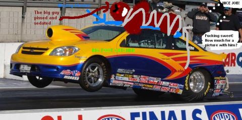2003 Ford Crown Victoria - A drag racing car is captured mid-air during a race, adorned with numerous sponsor decals.