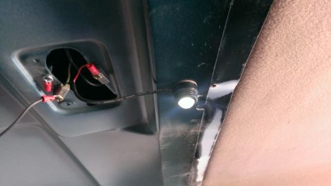 1994 Ford Bronco - Wiring for an interior light is visible, along with the light itself installed in a panel.