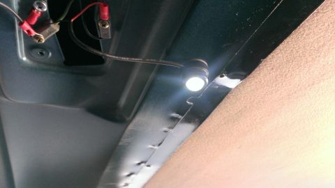 1994 Ford Bronco - Close-up view of an interior light fixture and its wiring.