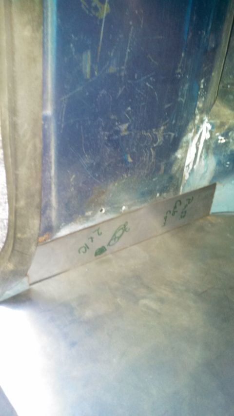 1979 Ford Bronco - A close-up view of a blue interior panel shows handwritten markings and a drawing.