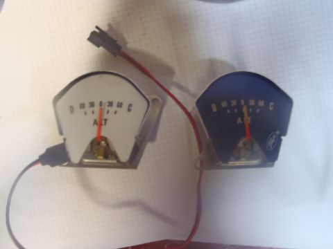 1970 Ford Bronco - Two automotive gauges, one white and one blue, are shown with their needles indicating 'ALT'.