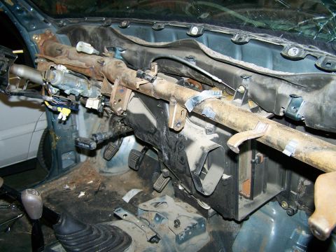 1988 Suzuki Samurai - Disassembled dashboard and steering column components are visible in this interior view.