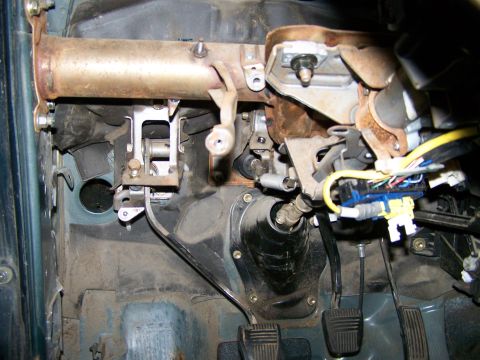 1988 Suzuki Samurai - Close-up of the interior dashboard showing mechanical parts and wiring harnesses.