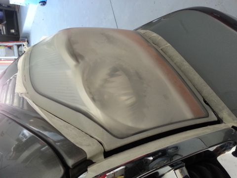 2007 Ford F-250 - The headlight assembly is taped off, ready for restoration work.