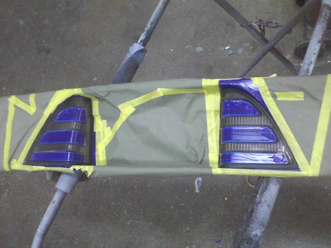2003 Ford Crown Victoria - Taillights are masked and covered for a paint job.