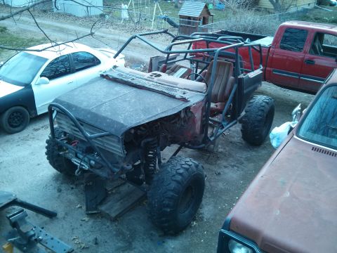 1986 Ford Bronco - Custom off-road buggy project in a yard with other vehicles present.