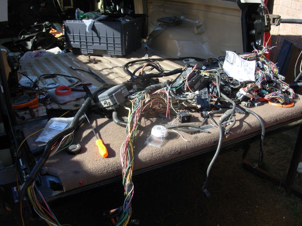 Ugh...  Lots of wiring mods in the engine bay harness, and the wires are LOOOOOOONG!