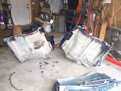 1988 Suzuki Samurai - The floor pans have been cut out and removed from a vehicle, likely for repair or modification.