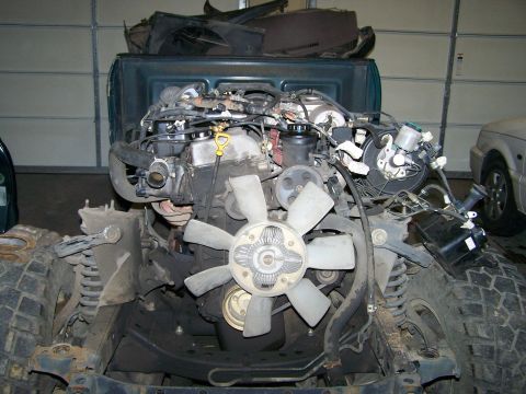 1988 Suzuki Samurai - Engine and front chassis parts are visible in this image, with a watermark for SuperMotors.net.
