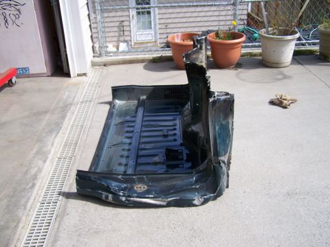 1988 Suzuki Samurai - This appears to be a damaged section of a vehicle's frame, not a complete vehicle.