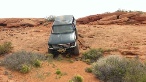 1994 Ford Bronco - This 1994 Ford Bronco navigates a challenging off-road course through a rocky desert landscape.