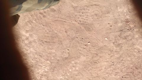 1994 Ford Bronco - Tire tracks are visible in the dirt, suggesting vehicle movement.