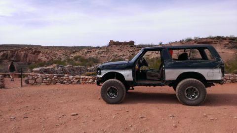 1994 Ford Bronco - This 1994 Ford Bronco is shown in a desert landscape with its doors removed and off-road tires.