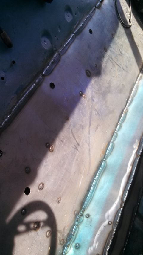 1979 Ford Bronco - This image shows a section of metal with fresh welds, suggesting repair or fabrication work.