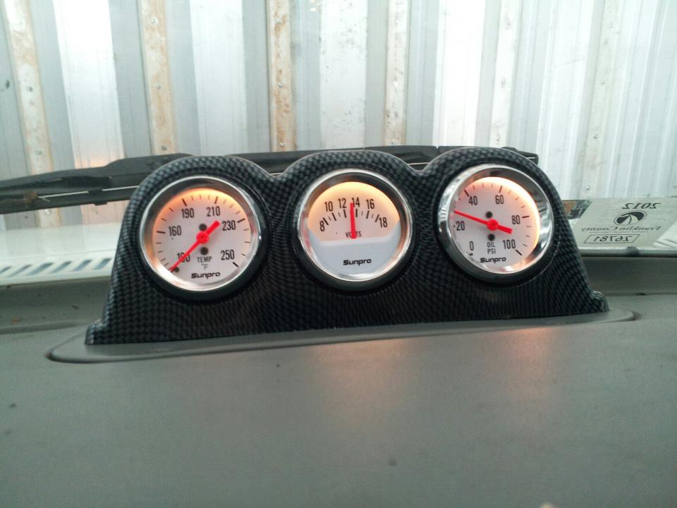 Triple gauge pod with Sunpro temperature, voltage, and oil pressure gauges