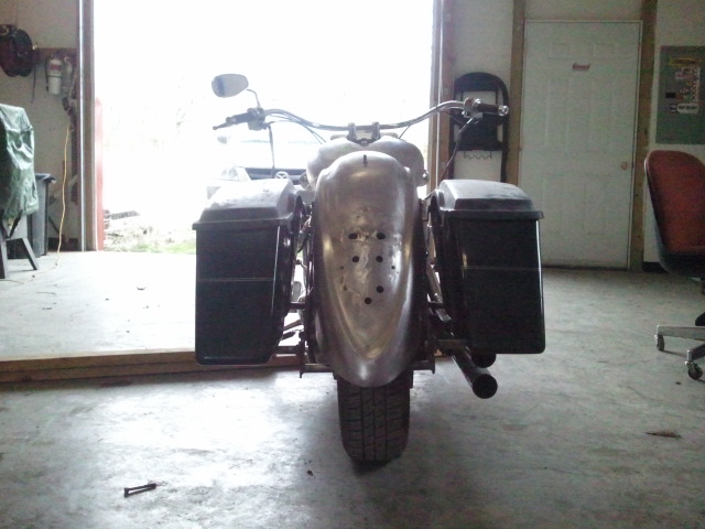 Motorcycle rear view with saddlebags and custom fender
