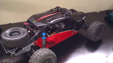 1996 Ford Bronco - This remote control rock crawler features a roll cage and large off-road tires.