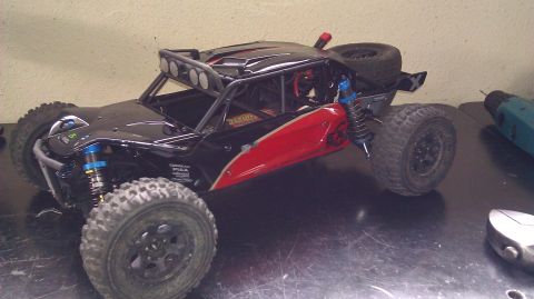 1996 Ford Bronco - This RC rock crawler has a detailed interior and exterior, including a spare tire mounted on the rear.